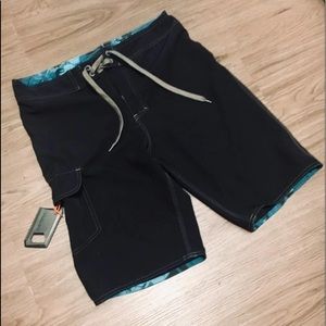 Burnside Board Shorts & wax comb